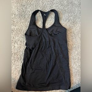 Size 6 black Lululemon razor back tank top with built in bra